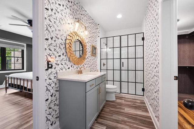 1228 Mill Dam Ln, Forest, VA 24551 - full bathroom with vanity, a ceiling fan, wood finished floors, toilet, and baseboards