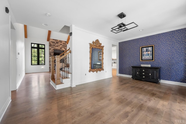 1228 Mill Dam Ln, Forest, VA 24551 - unfurnished living room featuring stairway, wood finished floors, wallpapered walls, baseboards, and ornamental molding