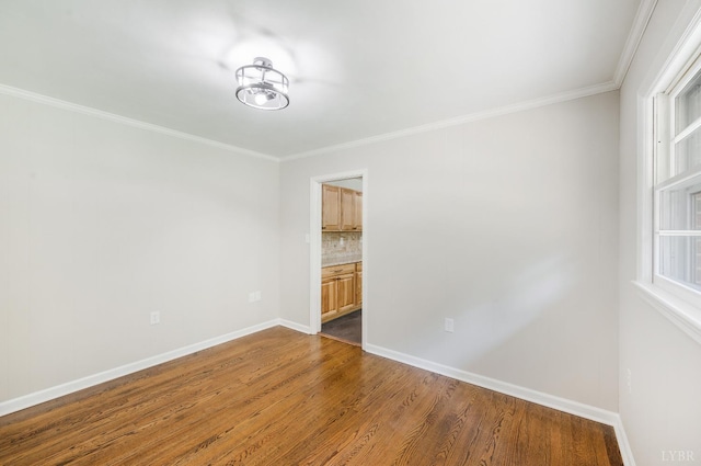 7230 Wards Rd, Rustburg, VA 24588 - spare room featuring dark wood finished floors, crown molding, and baseboards