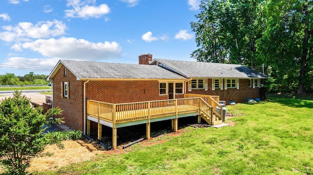 7230 Wards Rd, Rustburg, VA 24588 - back of house with a chimney, a yard, a deck, and brick siding