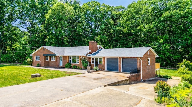 7230 Wards Rd, Rustburg, VA 24588 - ranch-style house featuring driveway, brick siding, a front lawn, and an attached garage