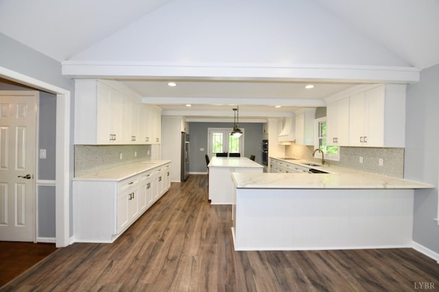 2130 Burnt Bridge Rd, Lynchburg, VA 24503 - kitchen with a sink, a peninsula, tasteful backsplash, dark wood-type flooring, and recessed lighting