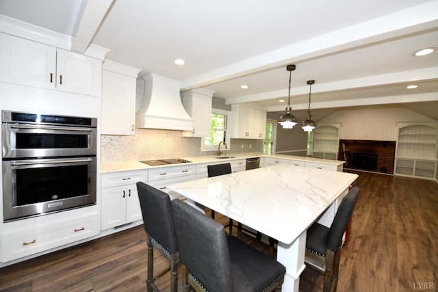 2130 Burnt Bridge Rd, Lynchburg, VA 24503 - kitchen with appliances with stainless steel finishes, custom range hood, a sink, a peninsula, and beam ceiling
