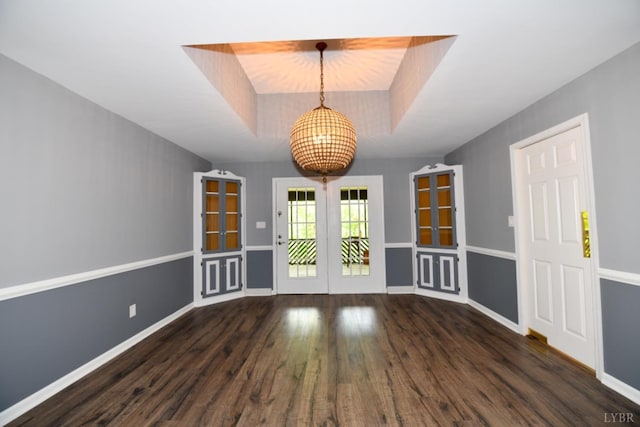 2130 Burnt Bridge Rd, Lynchburg, VA 24503 - unfurnished dining area with a chandelier, a raised ceiling, wood finished floors, french doors, and baseboards