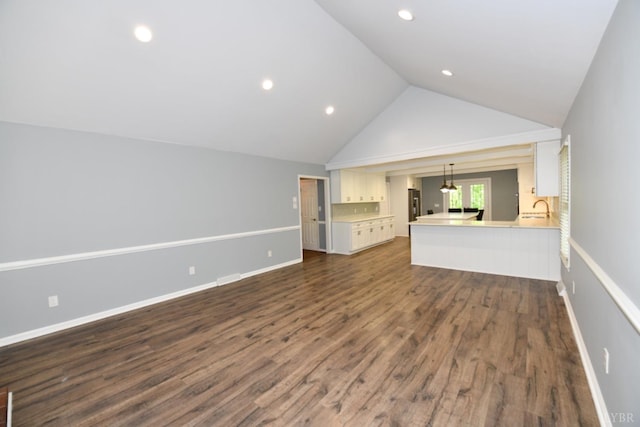 2130 Burnt Bridge Rd, Lynchburg, VA 24503 - unfurnished living room featuring lofted ceiling, dark wood-style floors, a sink, baseboards, and recessed lighting