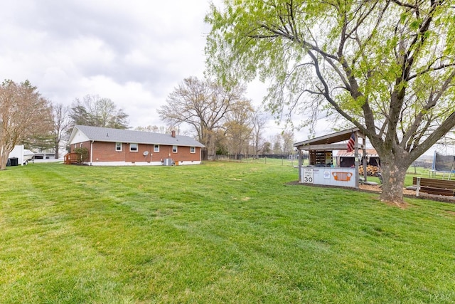 4100 Roark Mill Rd, Hurt, VA 24563 - view of yard with a trampoline