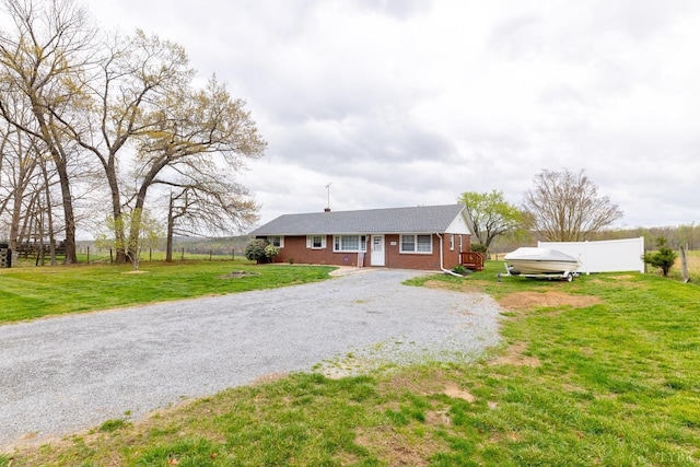 4100 Roark Mill Rd, Hurt, VA 24563 - ranch-style home with driveway, a front lawn, and brick siding
