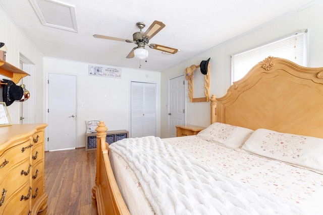 4100 Roark Mill Rd, Hurt, VA 24563 - bedroom with dark wood finished floors, attic access, a closet, a ceiling fan, and ornamental molding
