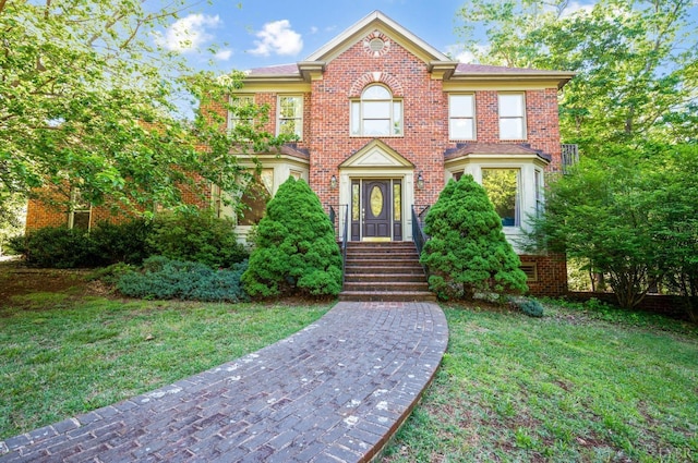 1068 Huckleberry Ln, Lynchburg, VA 24503 - colonial home featuring a front yard and brick siding