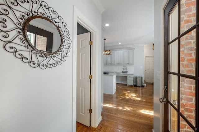 1068 Huckleberry Ln, Lynchburg, VA 24503 - hallway with wood finished floors, crown molding, and recessed lighting