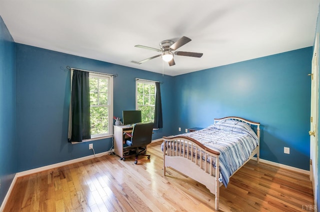 1068 Huckleberry Ln, Lynchburg, VA 24503 - bedroom with baseboards, wood finished floors, a ceiling fan, and an office area