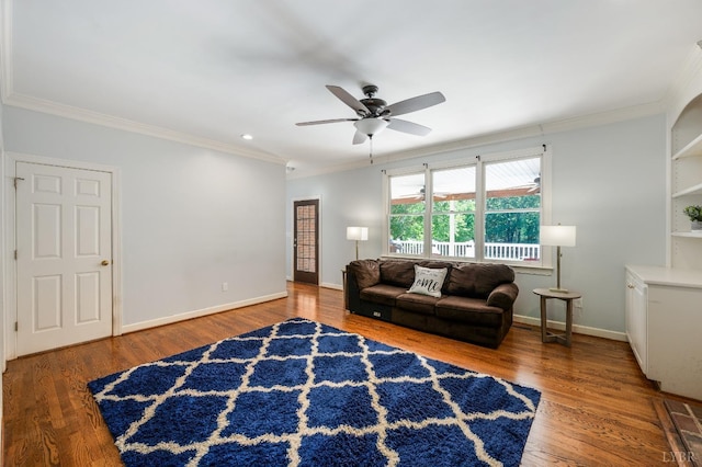 1068 Huckleberry Ln, Lynchburg, VA 24503 - living area featuring ornamental molding, ceiling fan, wood finished floors, and baseboards