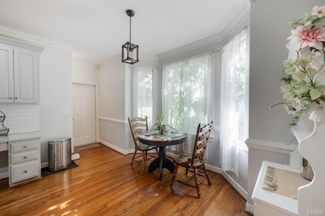 1068 Huckleberry Ln, Lynchburg, VA 24503 - dining area featuring healthy amount of natural light, light wood finished floors, baseboards, and ornamental molding