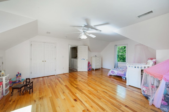 1068 Huckleberry Ln, Lynchburg, VA 24503 - bedroom with lofted ceiling, light wood-style floors, washer / clothes dryer, and ceiling fan