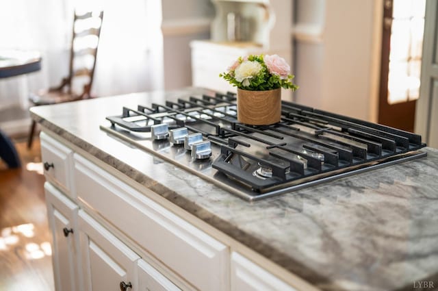 1068 Huckleberry Ln, Lynchburg, VA 24503 - kitchen view of stainless steel gas cooktop and white cabinetry