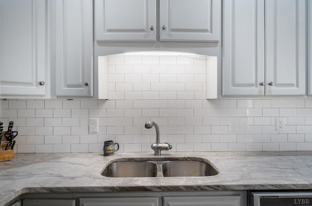 1068 Huckleberry Ln, Lynchburg, VA 24503 - kitchen with a sink, white cabinetry, decorative backsplash, and light stone counters