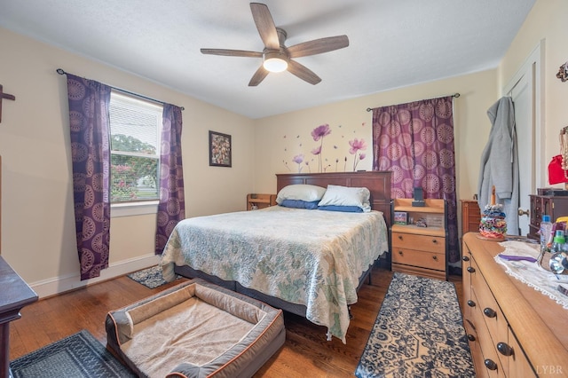 500 Leftwich St, Gretna, VA 24557 - bedroom with wood finished floors, a ceiling fan, and baseboards