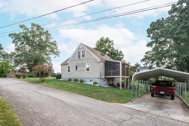 500 Leftwich St, Gretna, VA 24557 - view of home's exterior featuring a carport, a sunroom, a yard, and driveway