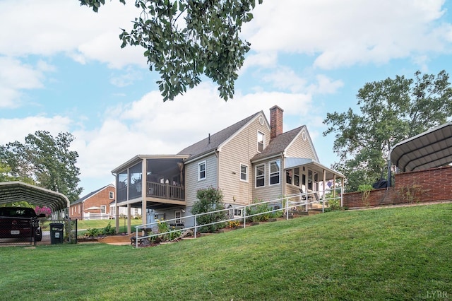 500 Leftwich St, Gretna, VA 24557 - back of property featuring a carport, a sunroom, and a chimney