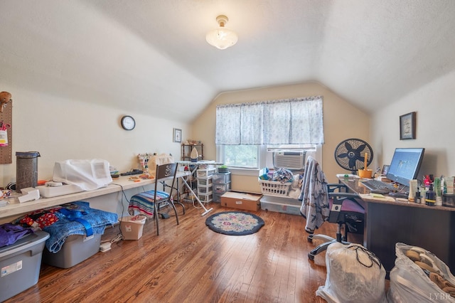 500 Leftwich St, Gretna, VA 24557 - office space featuring hardwood / wood-style flooring, vaulted ceiling, and cooling unit