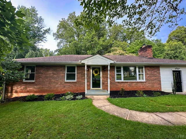 1426 Nelson Dr, Lynchburg, VA 24502 - single story home with brick siding, a front lawn, and a chimney