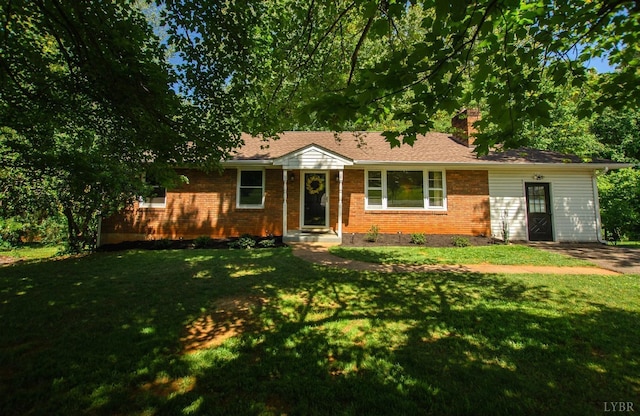 1426 Nelson Dr, Lynchburg, VA 24502 - ranch-style house featuring a front yard, brick siding, and a chimney
