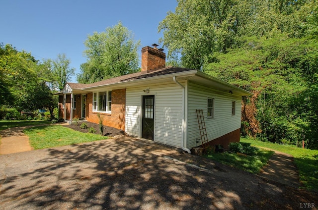 1426 Nelson Dr, Lynchburg, VA 24502 - view of side of property featuring a chimney and brick siding