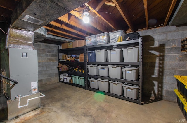 1426 Nelson Dr, Lynchburg, VA 24502 - unfinished below grade area featuring concrete block wall and heating unit
