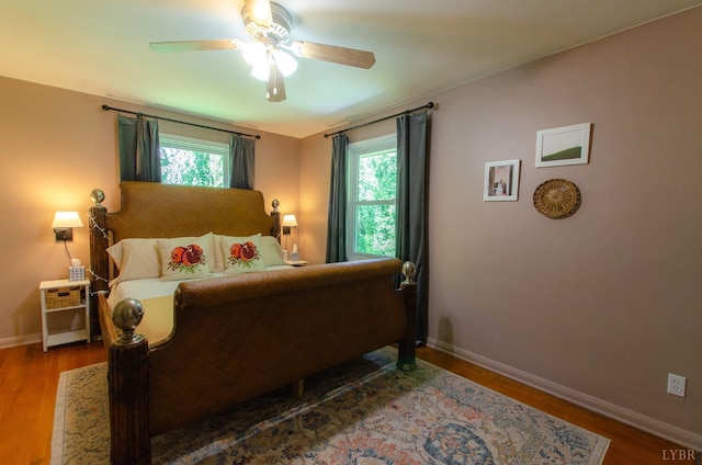 1426 Nelson Dr, Lynchburg, VA 24502 - bedroom featuring multiple windows, wood finished floors, and a ceiling fan