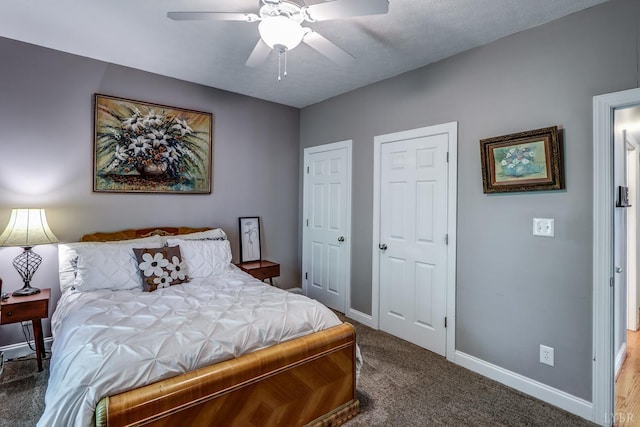206 Bella Ct, Lynchburg, VA 24502 - carpeted bedroom featuring baseboards, multiple closets, and a ceiling fan