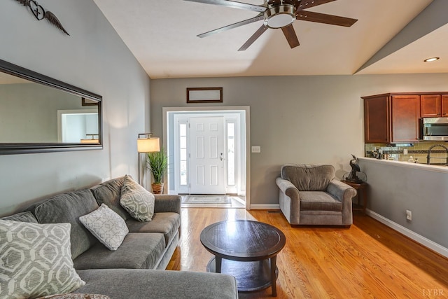 206 Bella Ct, Lynchburg, VA 24502 - living area with a ceiling fan, light wood-type flooring, and baseboards