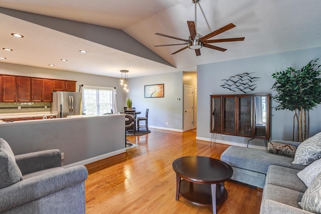 206 Bella Ct, Lynchburg, VA 24502 - living area featuring ceiling fan, light wood finished floors, vaulted ceiling, recessed lighting, and baseboards