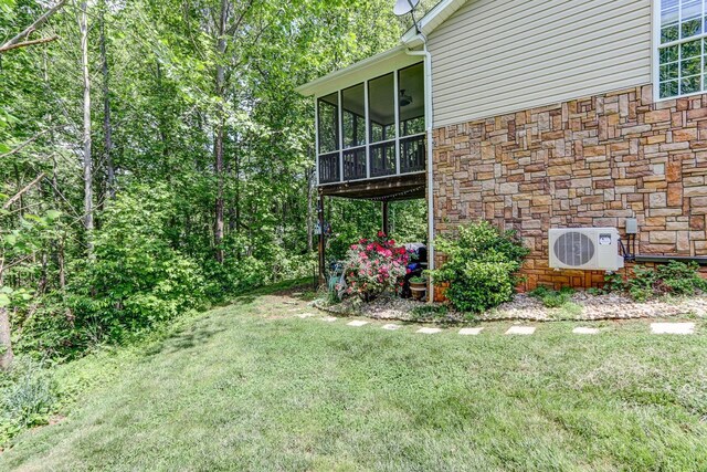 206 Bella Ct, Lynchburg, VA 24502 - view of grassy yard featuring a sunroom and ac unit