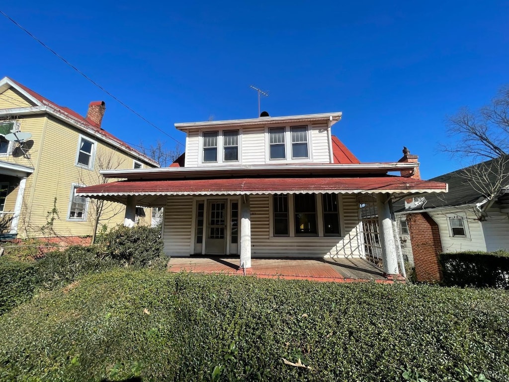 rear view of house featuring a patio area