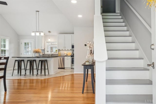 112 Cedarwood Ct, Forest, VA 24551 - stairway with lofted ceiling, recessed lighting, and wood finished floors