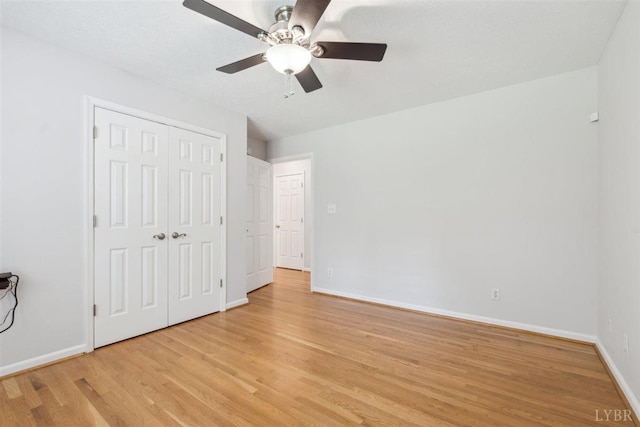 112 Cedarwood Ct, Forest, VA 24551 - unfurnished bedroom featuring light wood-style floors, baseboards, a closet, and ceiling fan