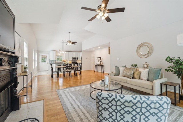 112 Cedarwood Ct, Forest, VA 24551 - living area with a ceiling fan, light wood finished floors, and high vaulted ceiling