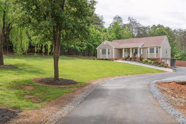 112 Cedarwood Ct, Forest, VA 24551 - single story home with driveway, a front lawn, and a porch