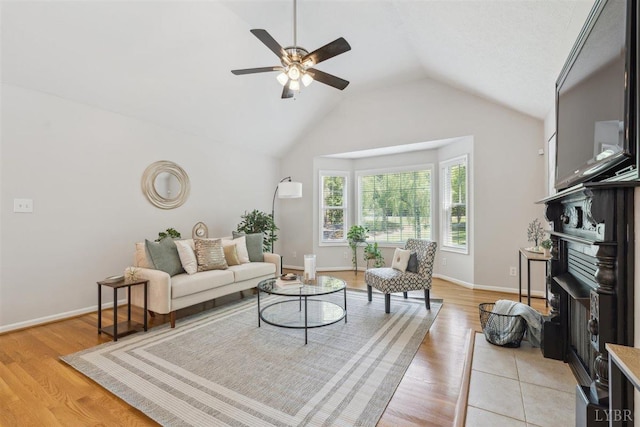 112 Cedarwood Ct, Forest, VA 24551 - living room with lofted ceiling, ceiling fan, a fireplace, light wood finished floors, and baseboards