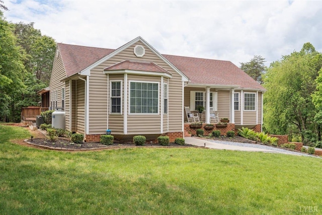 112 Cedarwood Ct, Forest, VA 24551 - view of front facade featuring a porch, central AC unit, a front lawn, and roof with shingles