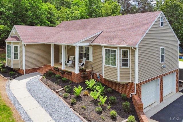 112 Cedarwood Ct, Forest, VA 24551 - view of front of house with a porch, a garage, a shingled roof, and driveway