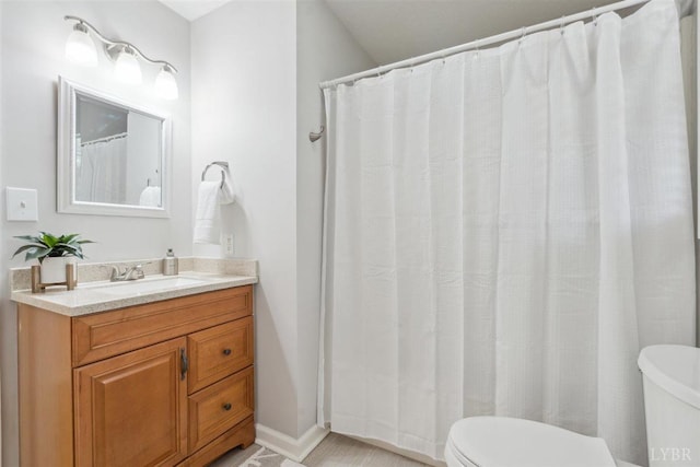 112 Cedarwood Ct, Forest, VA 24551 - full bath with toilet, vanity, and baseboards