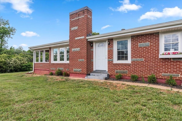 3733 Depot Rd, Rustburg, VA 24588 - view of front of house with a front yard, brick siding, entry steps, and crawl space