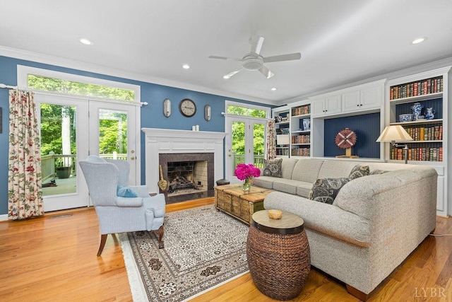 4936 Mountain Laurel Dr, Lynchburg, VA 24503 - living area with crown molding, plenty of natural light, ceiling fan, light wood-type flooring, and recessed lighting