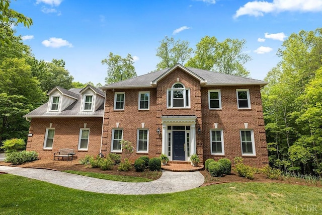 4936 Mountain Laurel Dr, Lynchburg, VA 24503 - georgian-style home with a front yard and brick siding