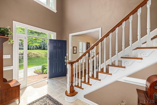 4936 Mountain Laurel Dr, Lynchburg, VA 24503 - foyer entrance with a towering ceiling, stairway, and tile patterned floors