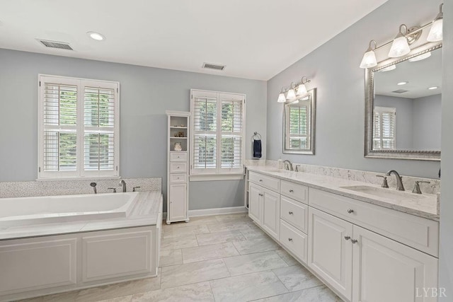 4936 Mountain Laurel Dr, Lynchburg, VA 24503 - full bathroom with double vanity, plenty of natural light, a bath, and marble finish flooring
