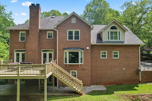 4936 Mountain Laurel Dr, Lynchburg, VA 24503 - back of property with a chimney, brick siding, a deck, stairway, and a shingled roof