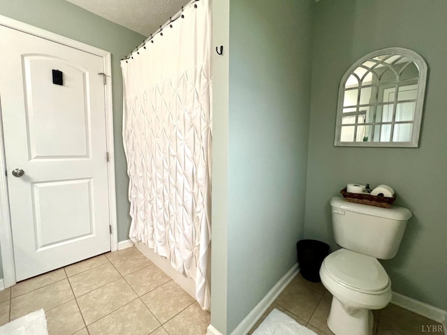 605 Beeks Ln, Spout Spring, VA 24593 - full bath with toilet, tile patterned floors, a shower with shower curtain, and a textured ceiling