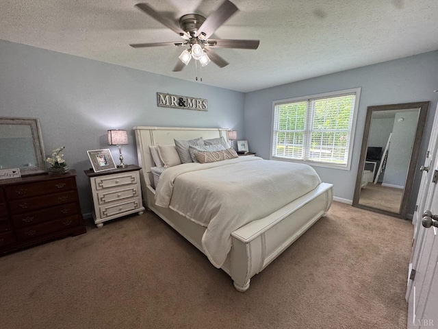 605 Beeks Ln, Spout Spring, VA 24593 - carpeted bedroom with a textured ceiling, ceiling fan, and baseboards